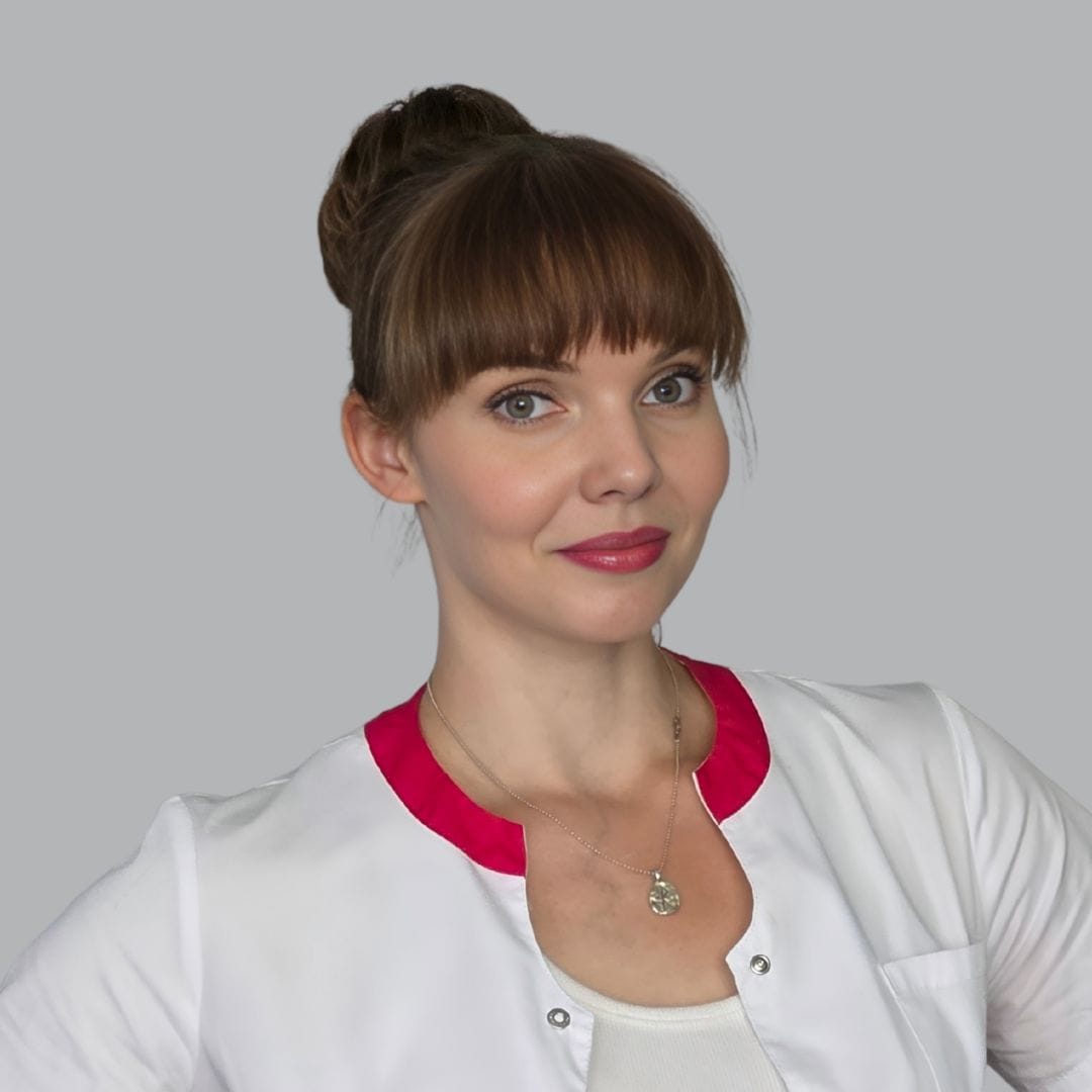 Zdjęcie przedstawia specjalistkę ginekologii i położnictwa Agnieszkę Natalię Jaintę udzielającą konsultacji ginekologicznych w Zabrzu. Natalia Jainta